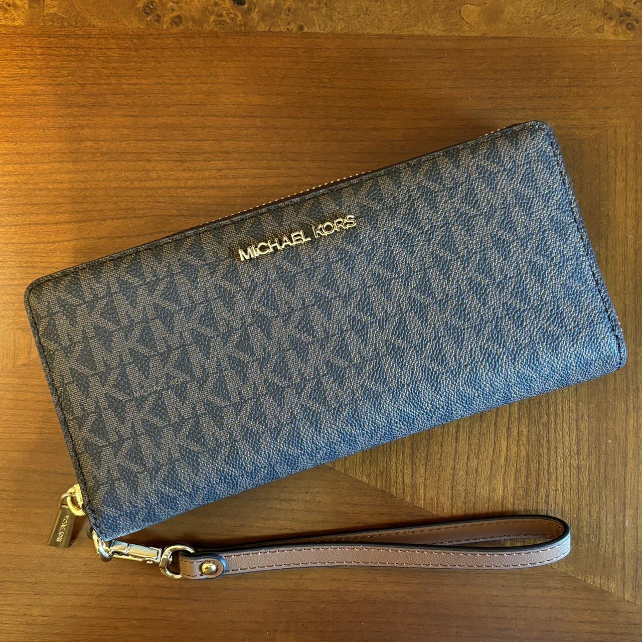 Michael Kors Jet set large wallet. Online for 130. Depop