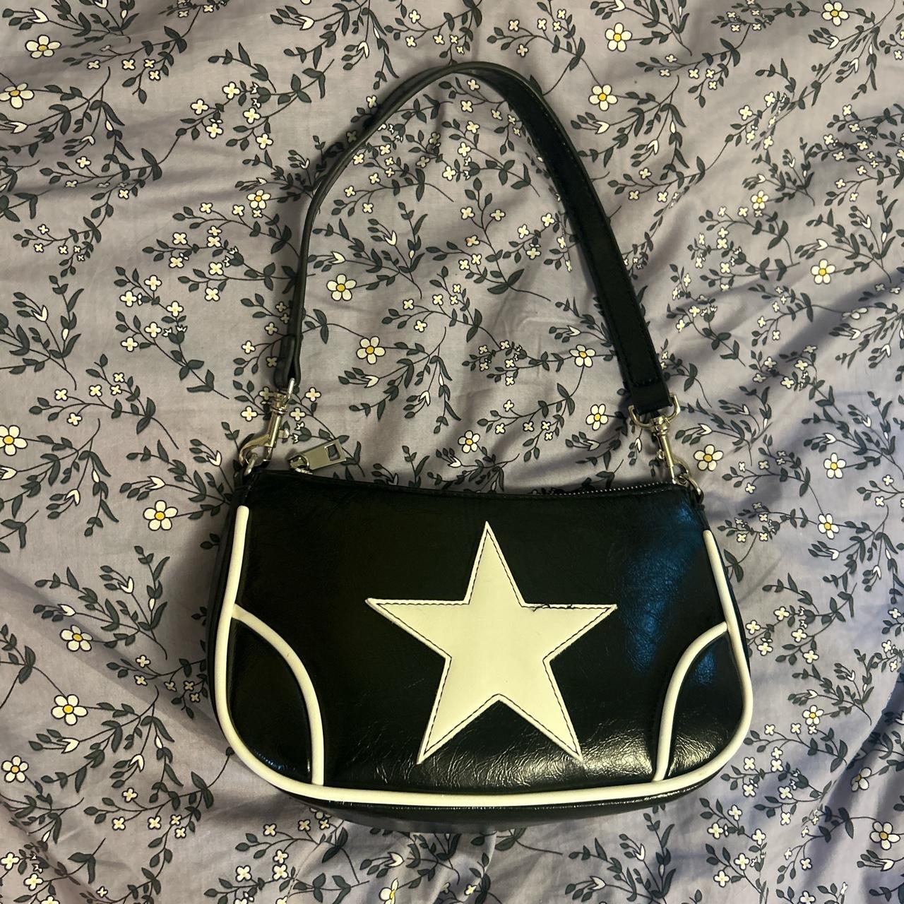 urban outfitters star shoulder bag. A few loose... Depop