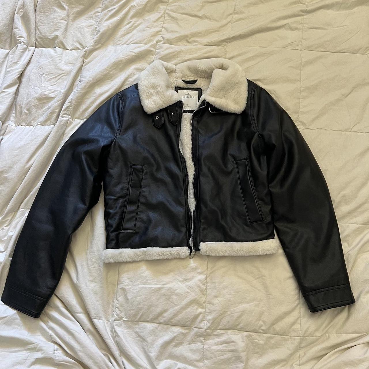 Black and white leather jacket with faux fur from... Depop