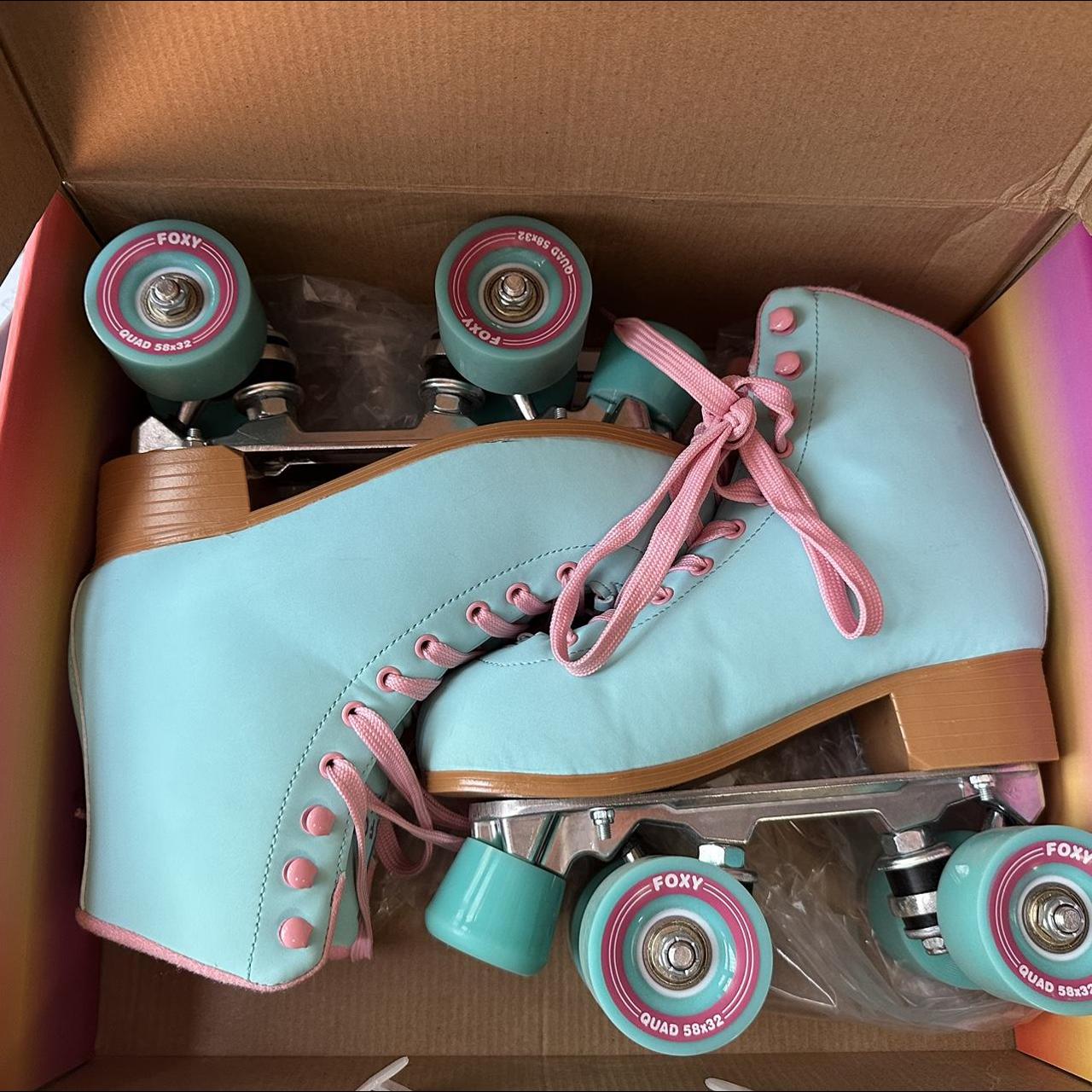 Size 7: Blue and Pink roller skates from Foxy...