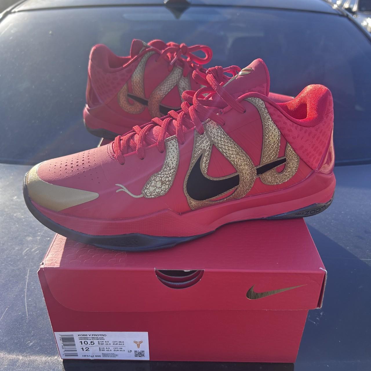 red and gold nike trainers