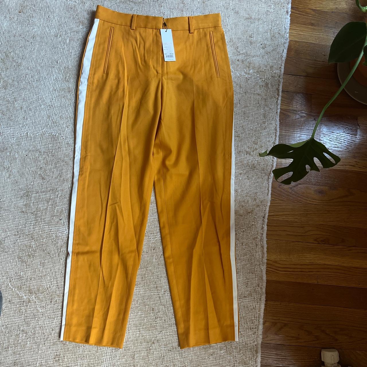 Calvin Klein Women's Yellow Trousers | Depop