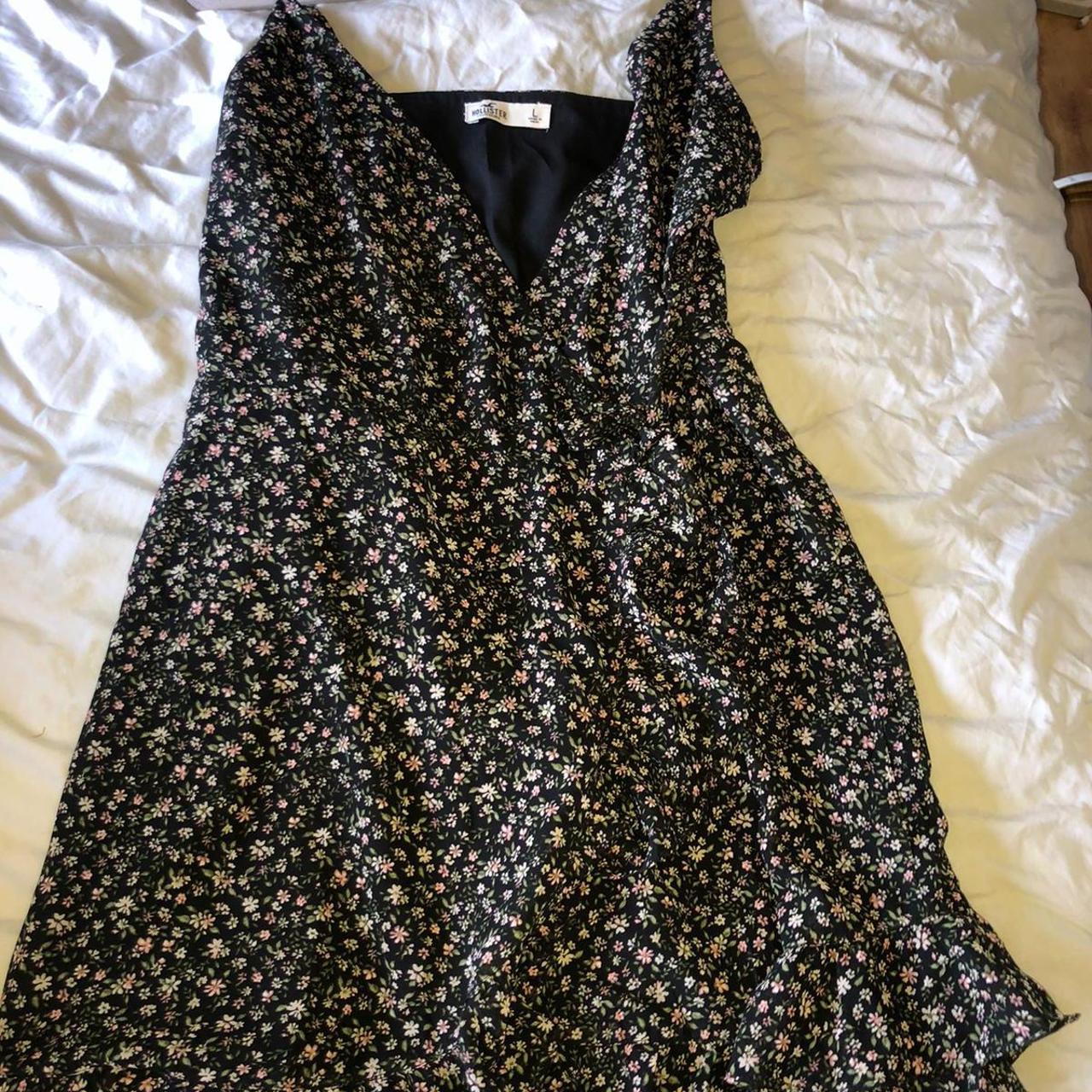 Black Hollister tie over dress lovely floral print... - Depop