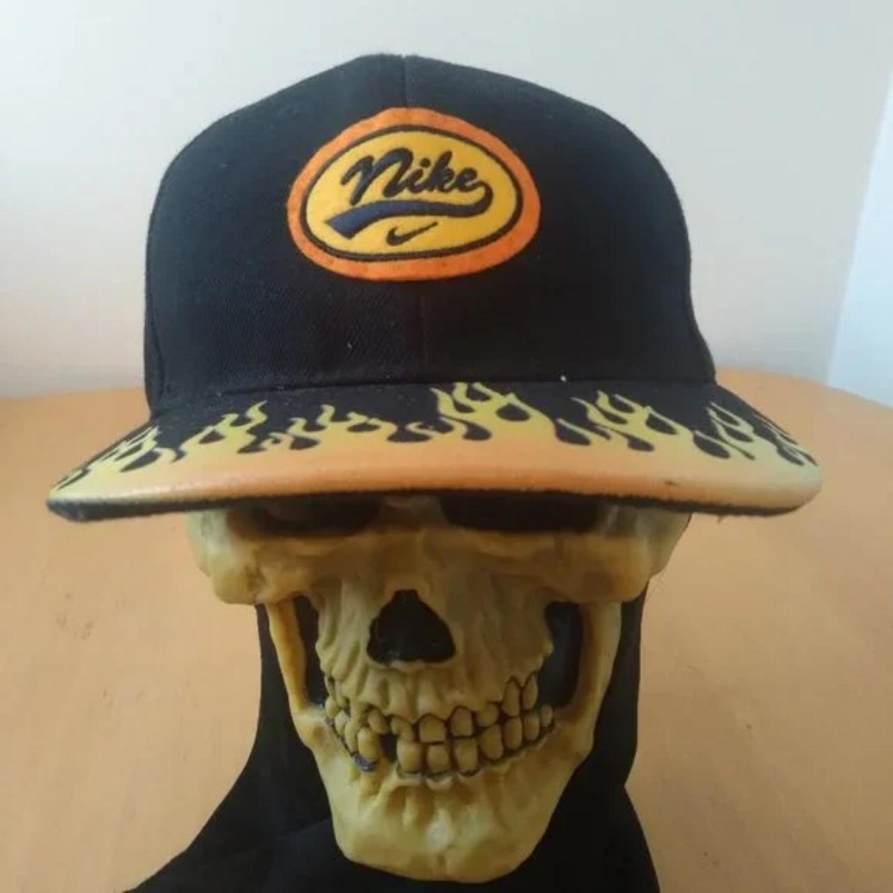 orange nike skull cap