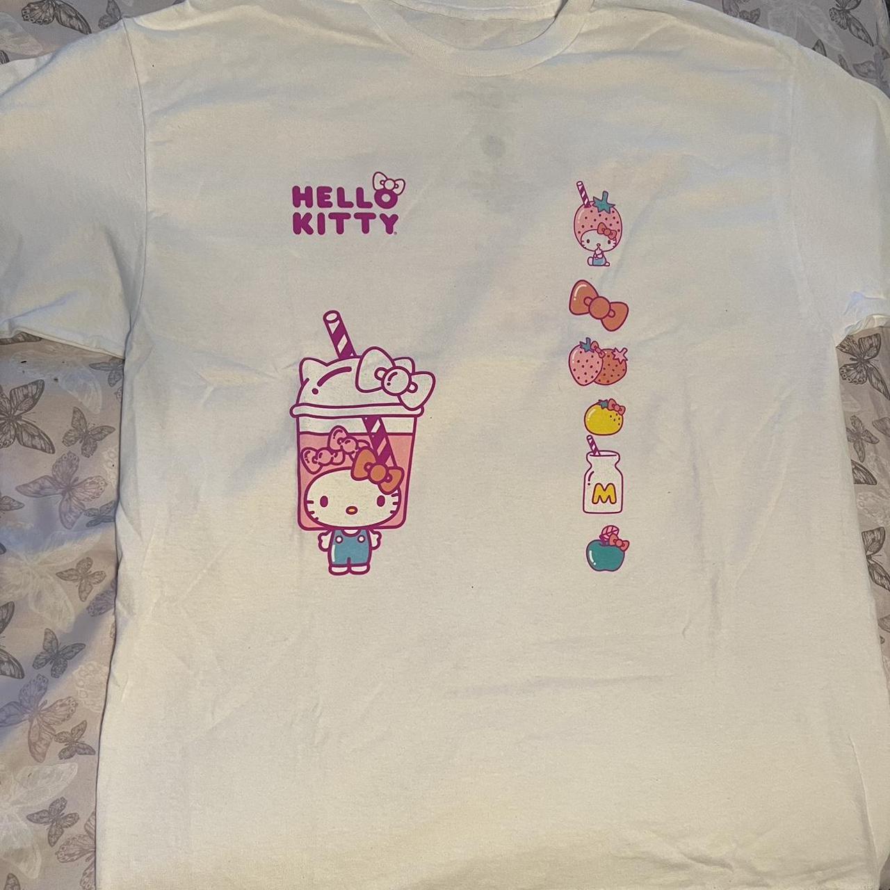 white Hello Kitty design t-shirt with four tiny - Depop