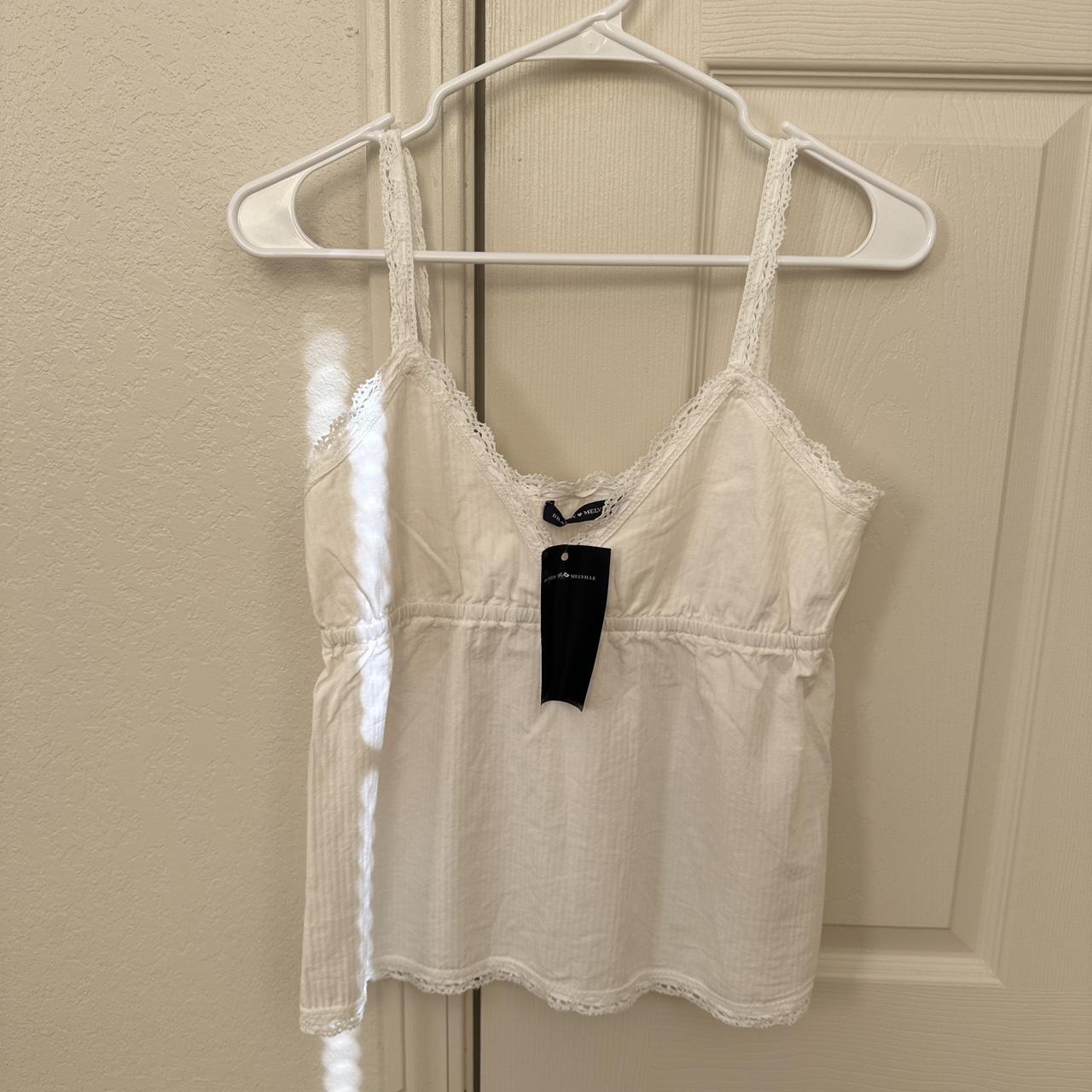 brandy melville edith tank. it’s so cute but big on... - Depop