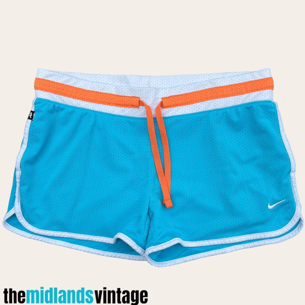 Blue and orange nike shorts womens hotsell