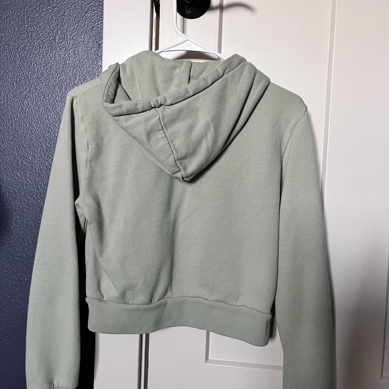 Brandy Melville Women's Green Hoodie Depop