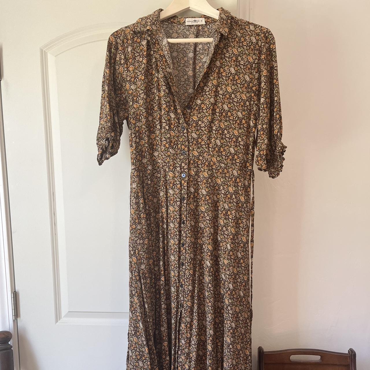 Brown floral button-up tie back maxi dress from... - Depop