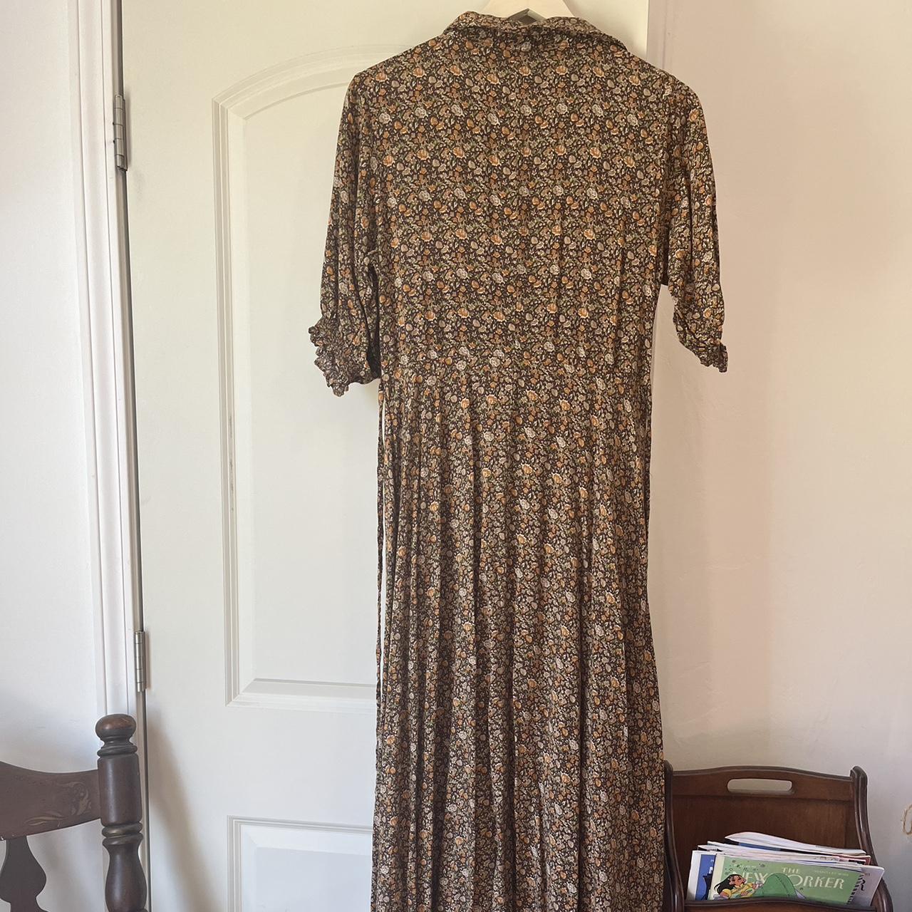 Brown floral button-up tie back maxi dress from... - Depop