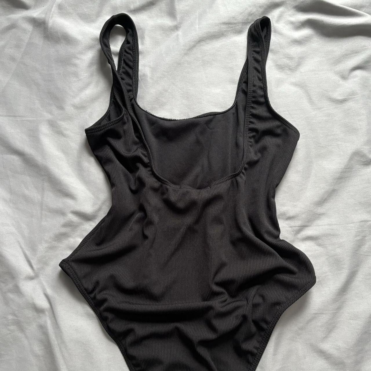 black ribbed one piece swimsuit size 10 - Depop