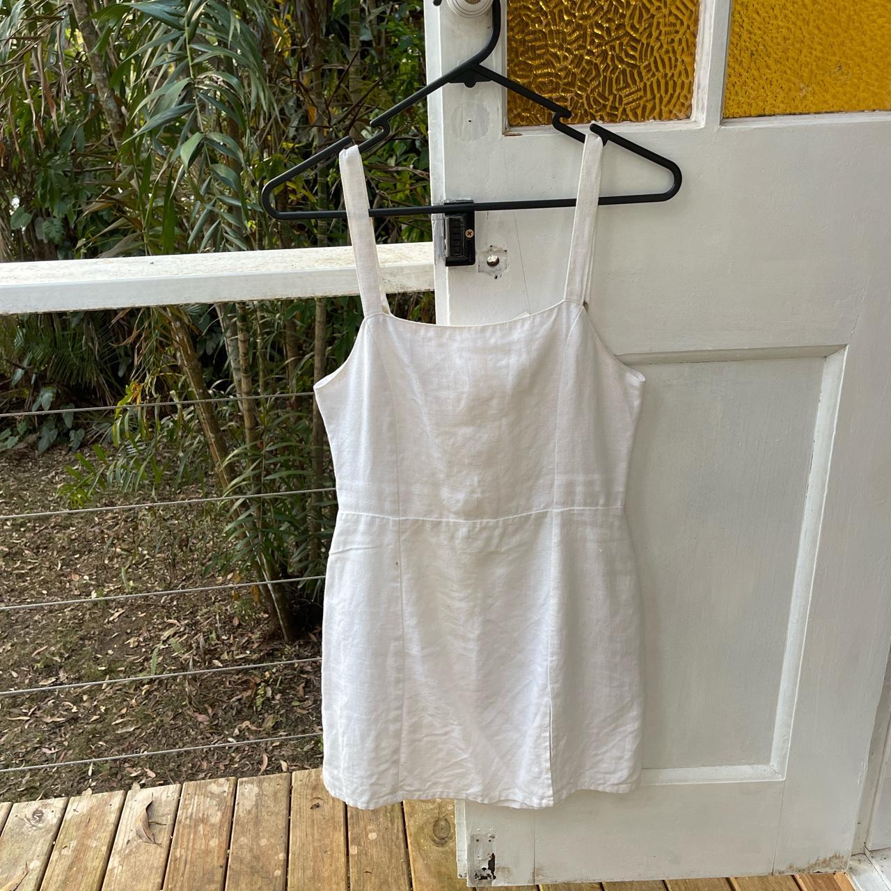 Zulu & Zephyr white dress with small leg slit Size... Depop