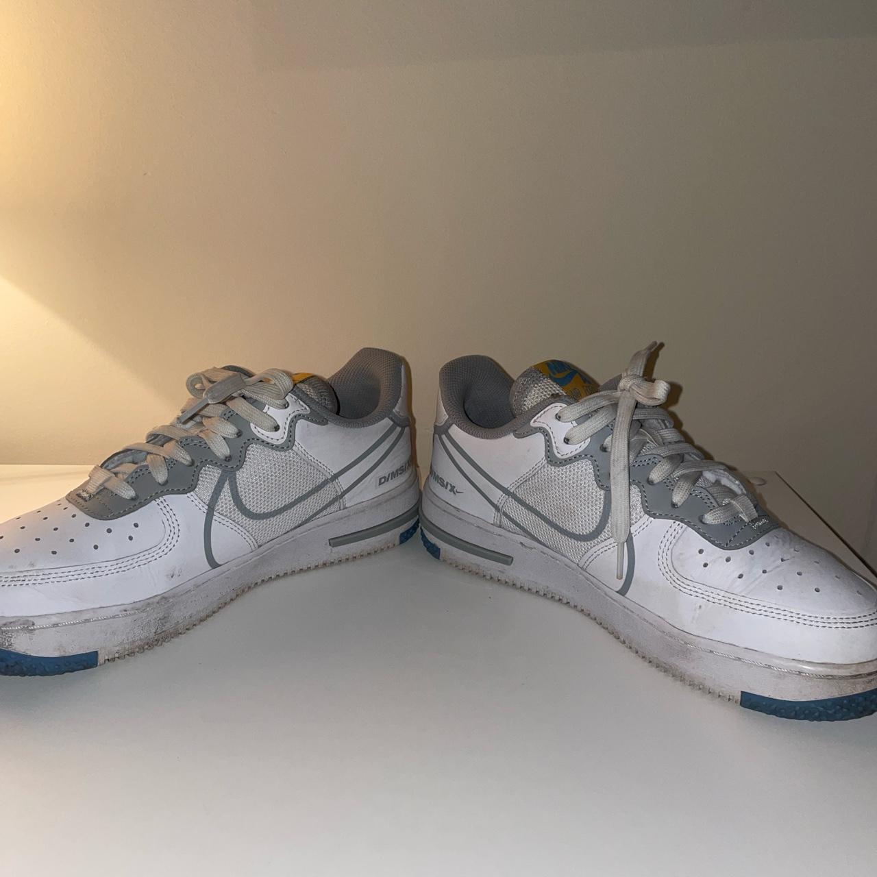 gray and white nike air