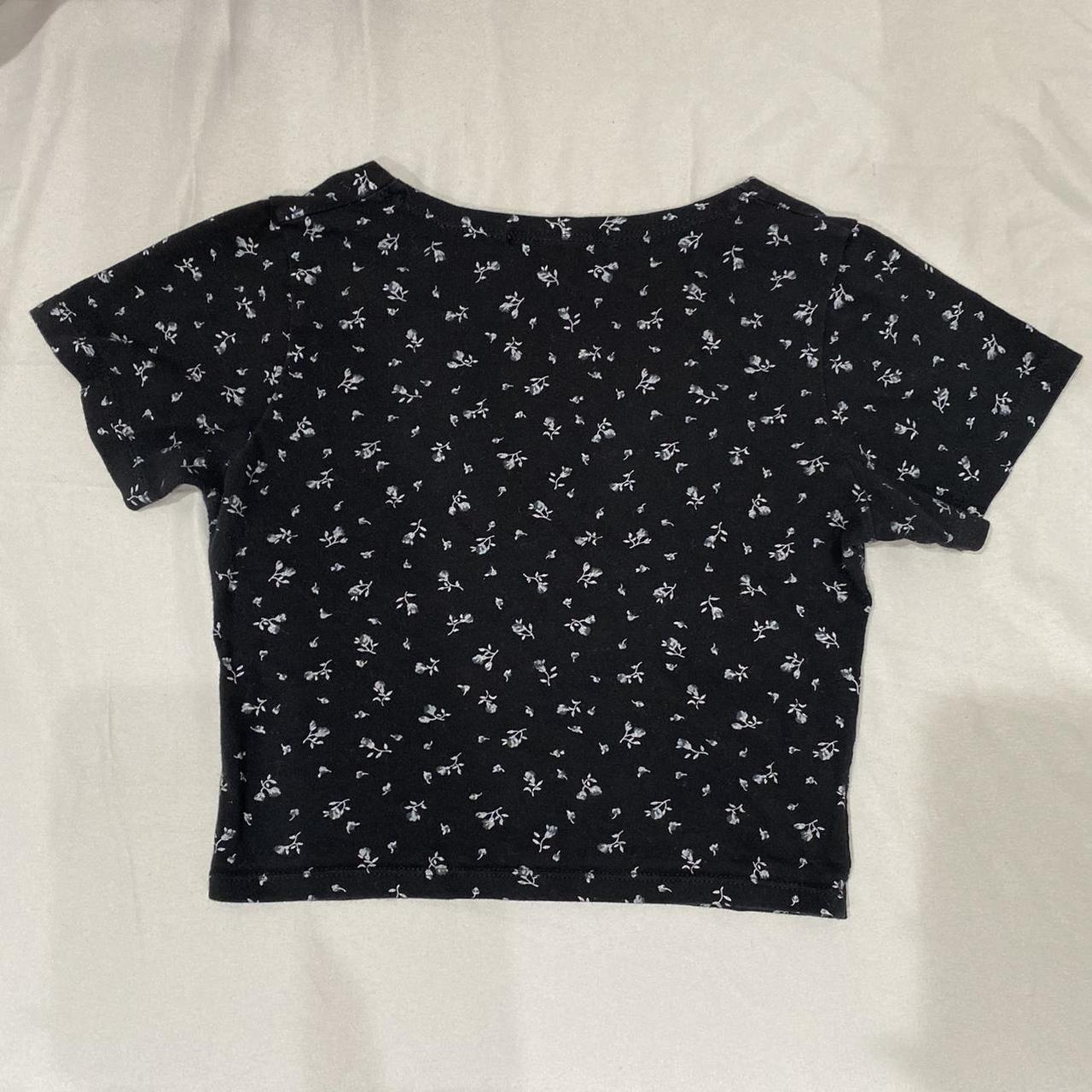 Brandy Melville navy blue floral Amara top Like new - Depop