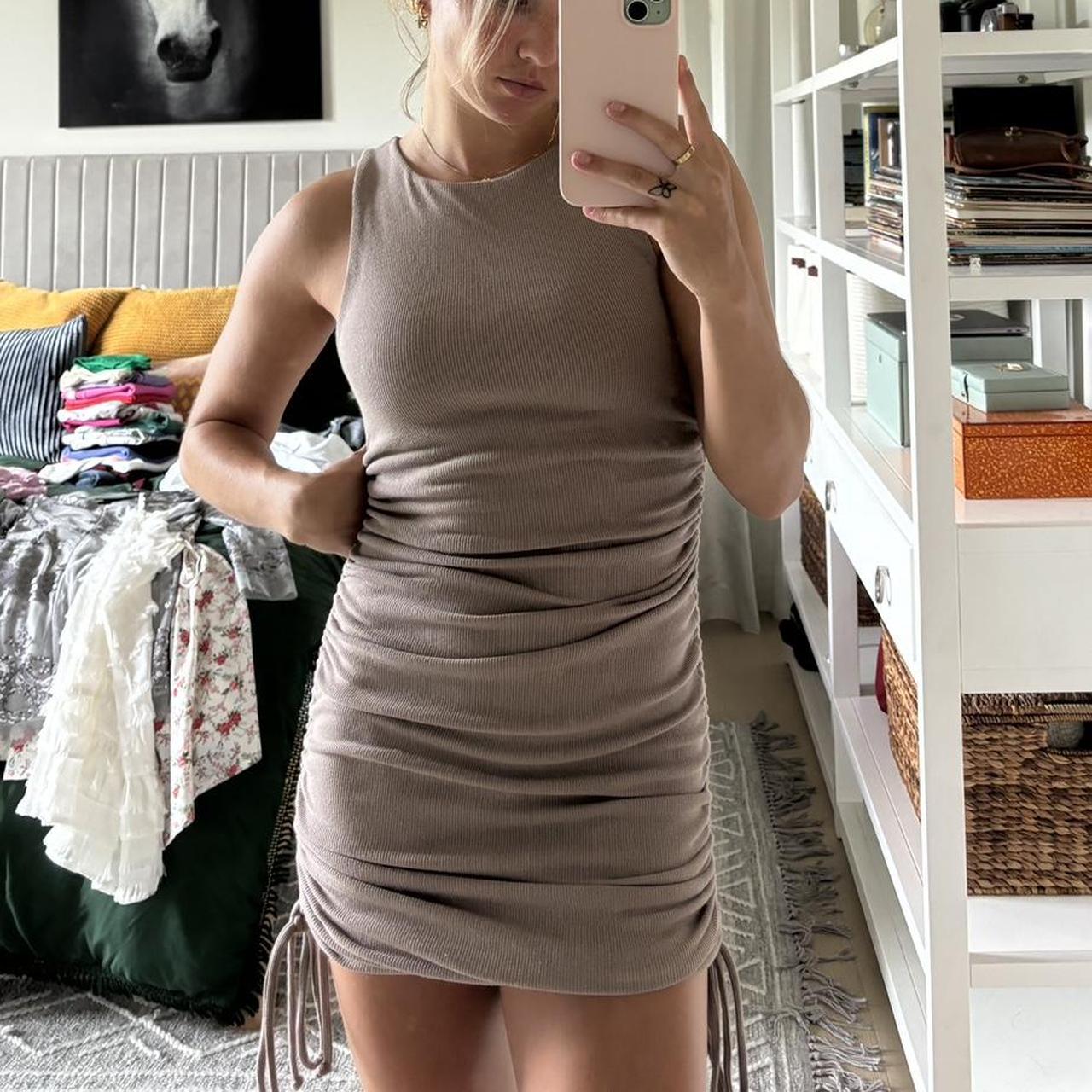 Light brown bodycon mini dress Ties on side for... - Depop