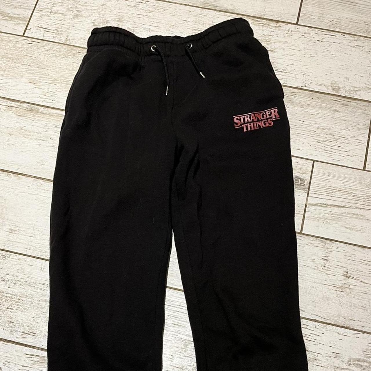 Stranger Things Black Joggers Small bleach mark on