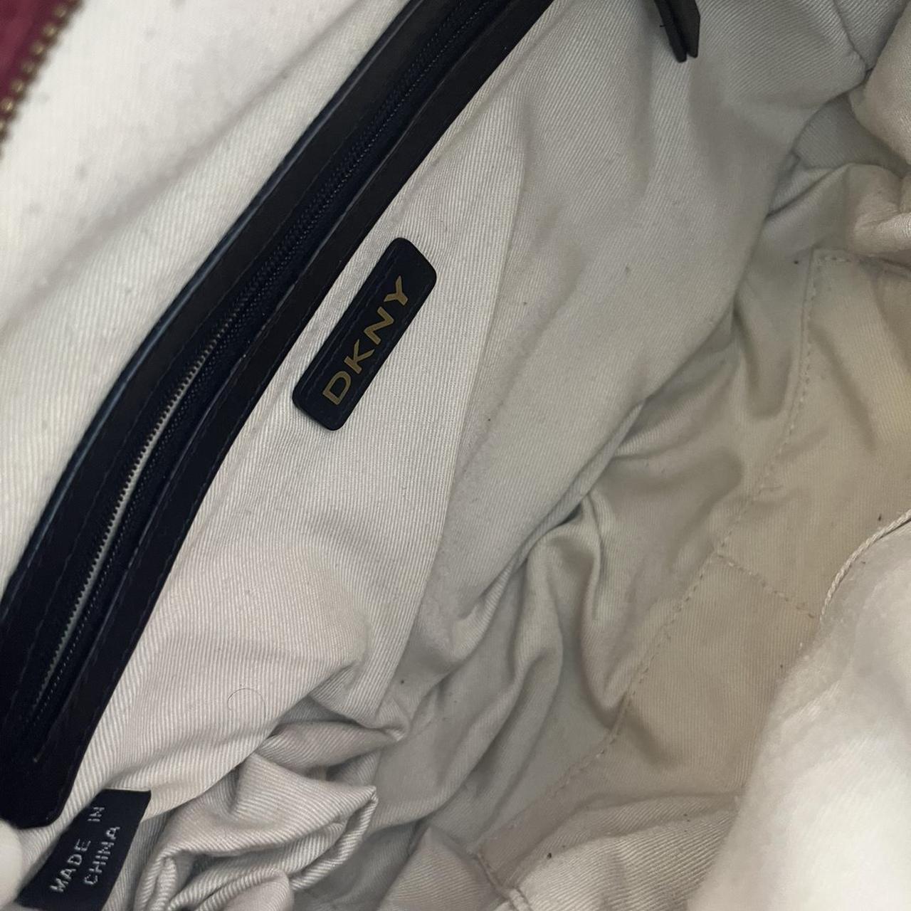 Medium size beige/nude DKNY bag. Used a few times - Depop