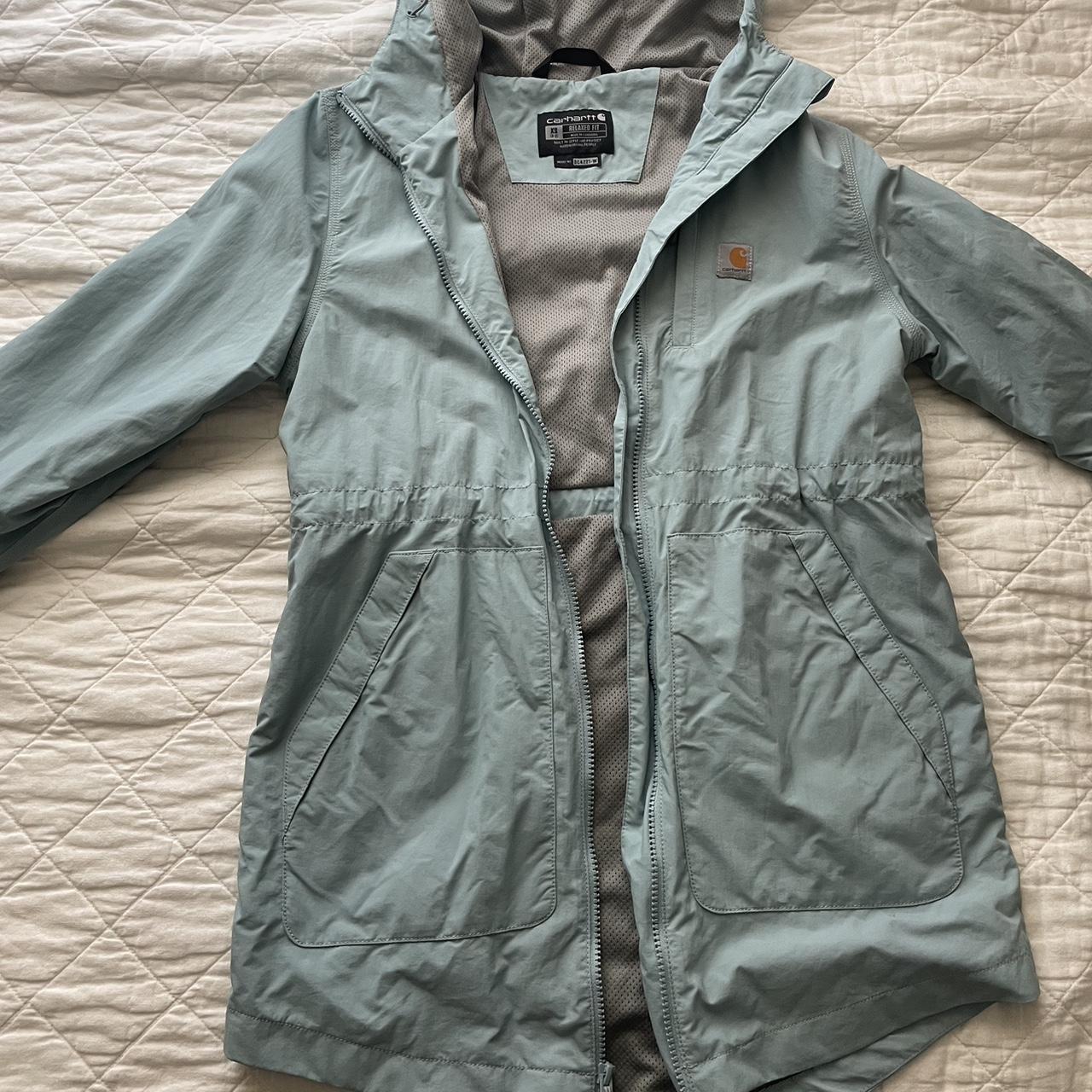 light blue carhartt rain jacket with gray interior,... Depop