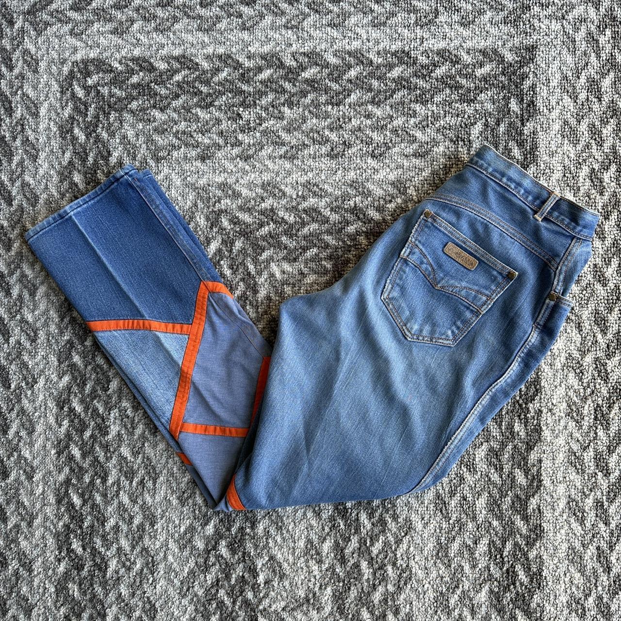 Jeans with orange on sale stripe