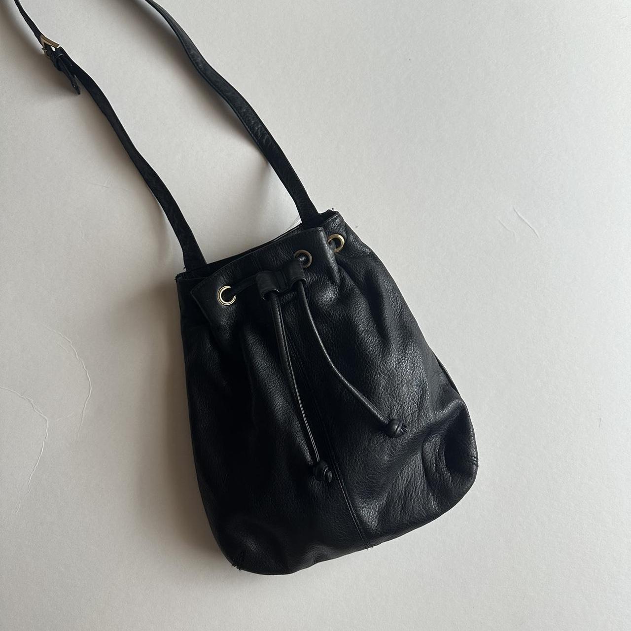 leather cinch bag w gold details no major flaws... Depop