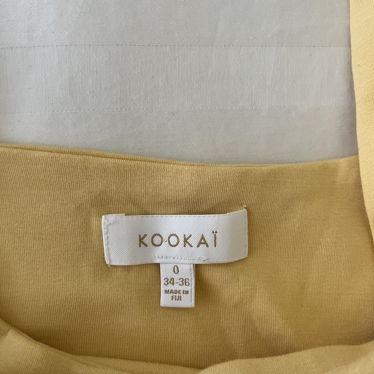 Kookaï yellow crop top Never worn before/stretchy... Depop