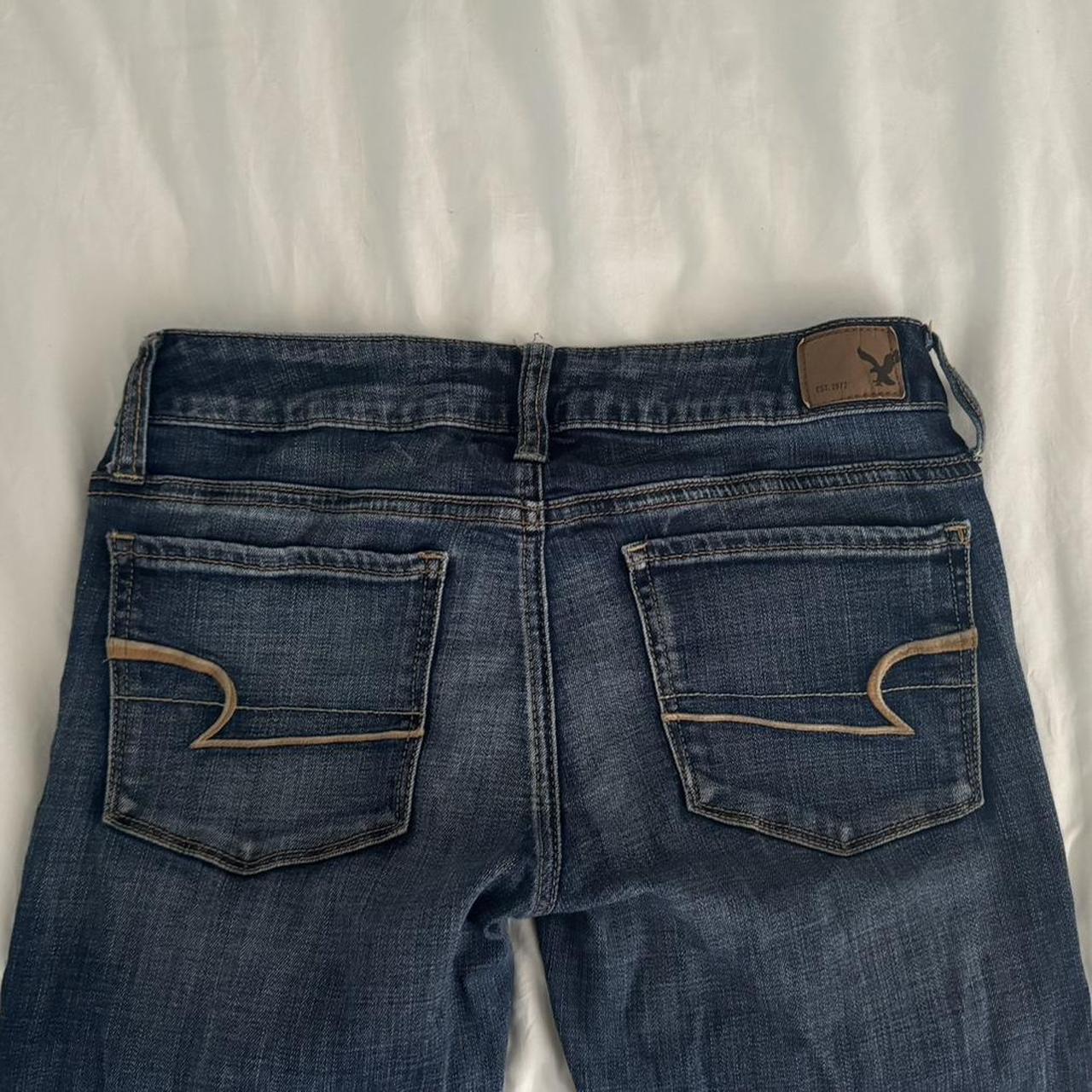 Medium wash American eagle low rise skinny jeans.... - Depop