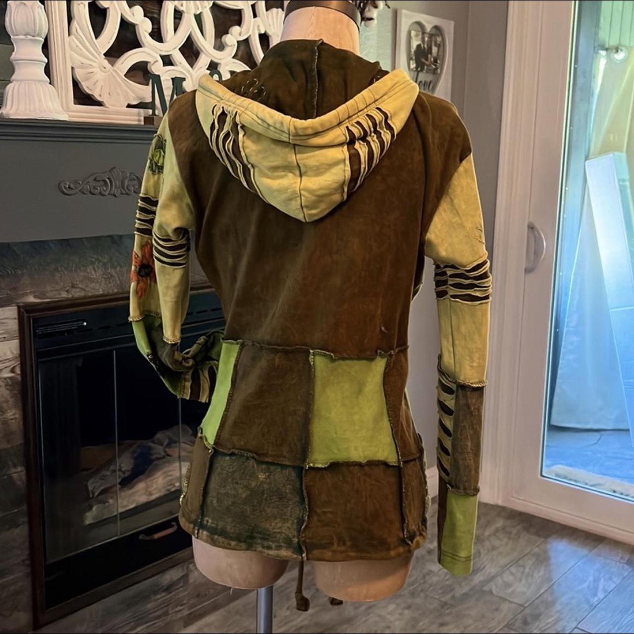 Kathmandu zip up hoodie. It is beautiful with flared... Depop