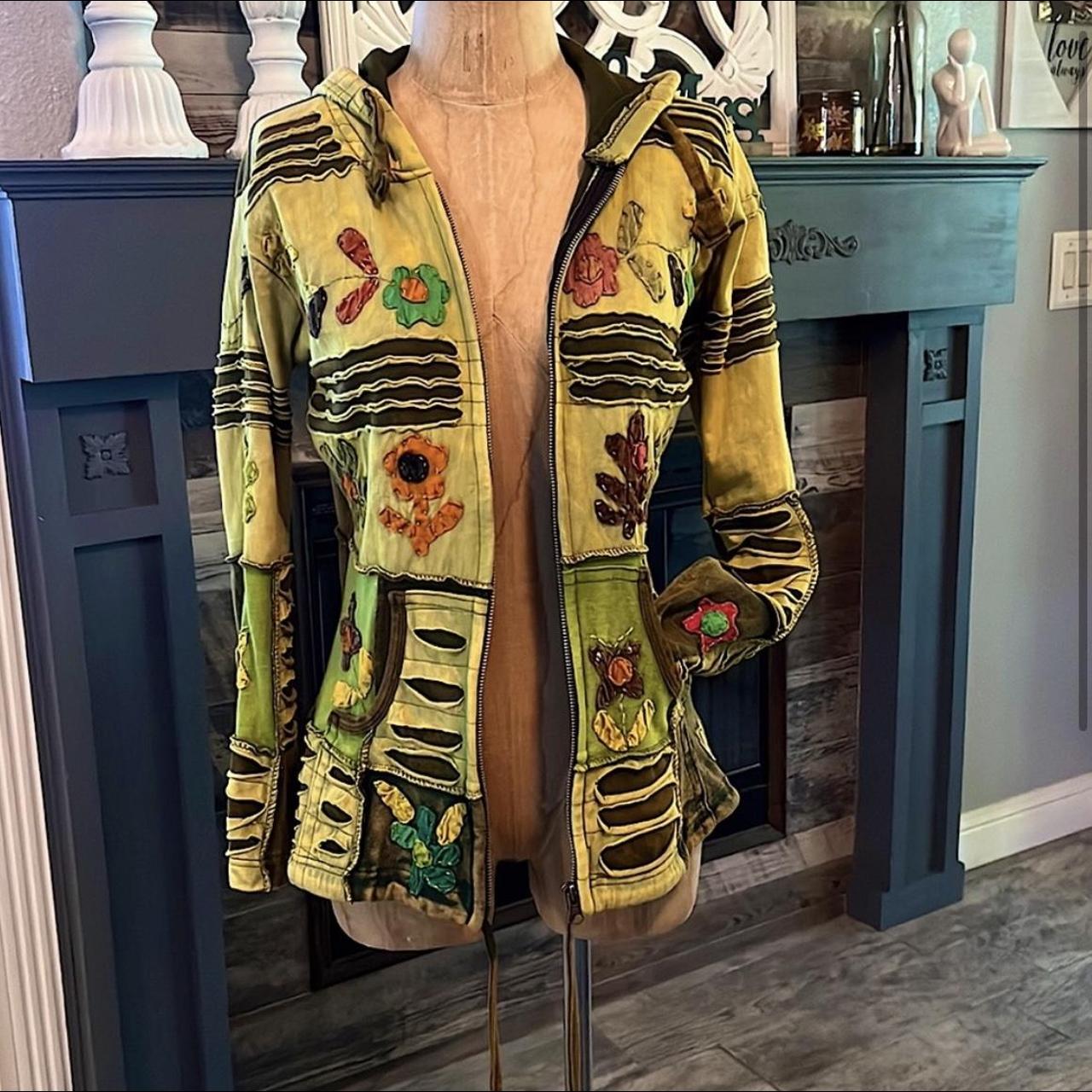 Kathmandu zip up hoodie. It is beautiful with flared... Depop