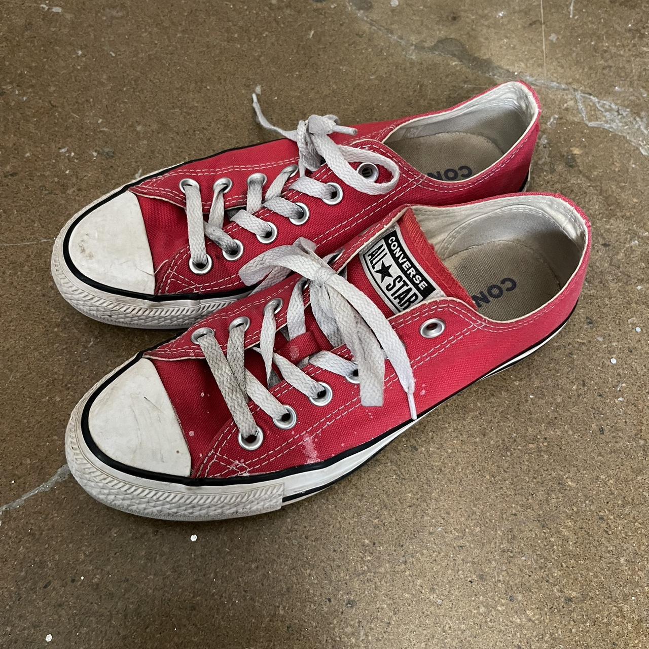 Beat up red converse best sale