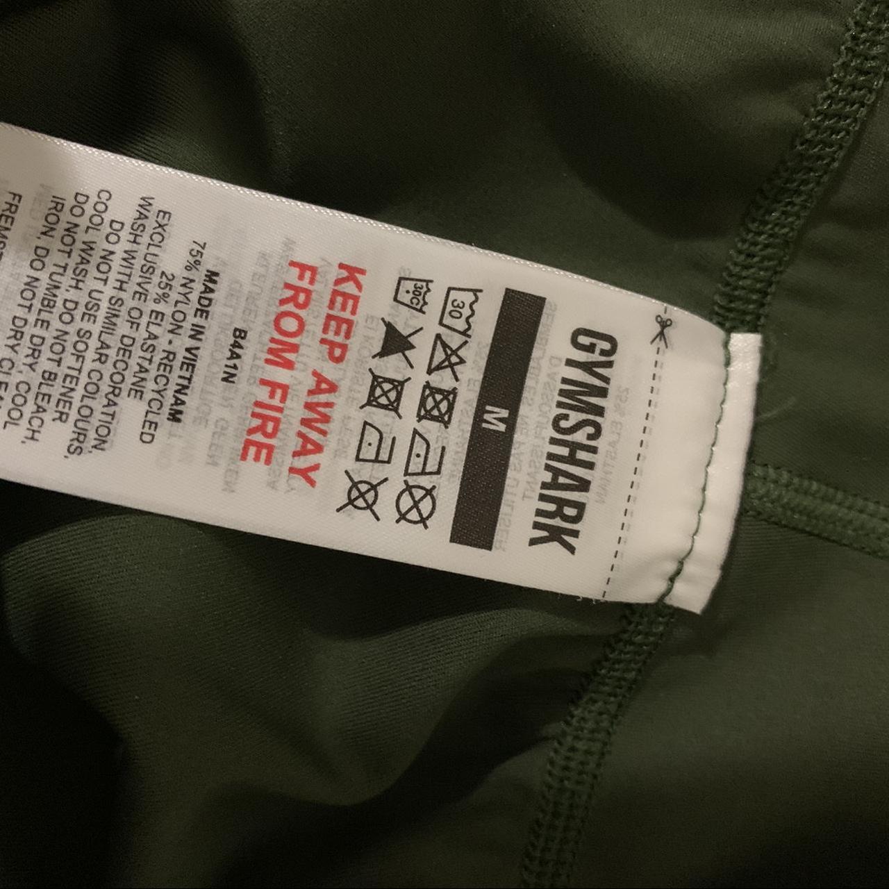 Gymshark flare leggings in olive green size M Depop