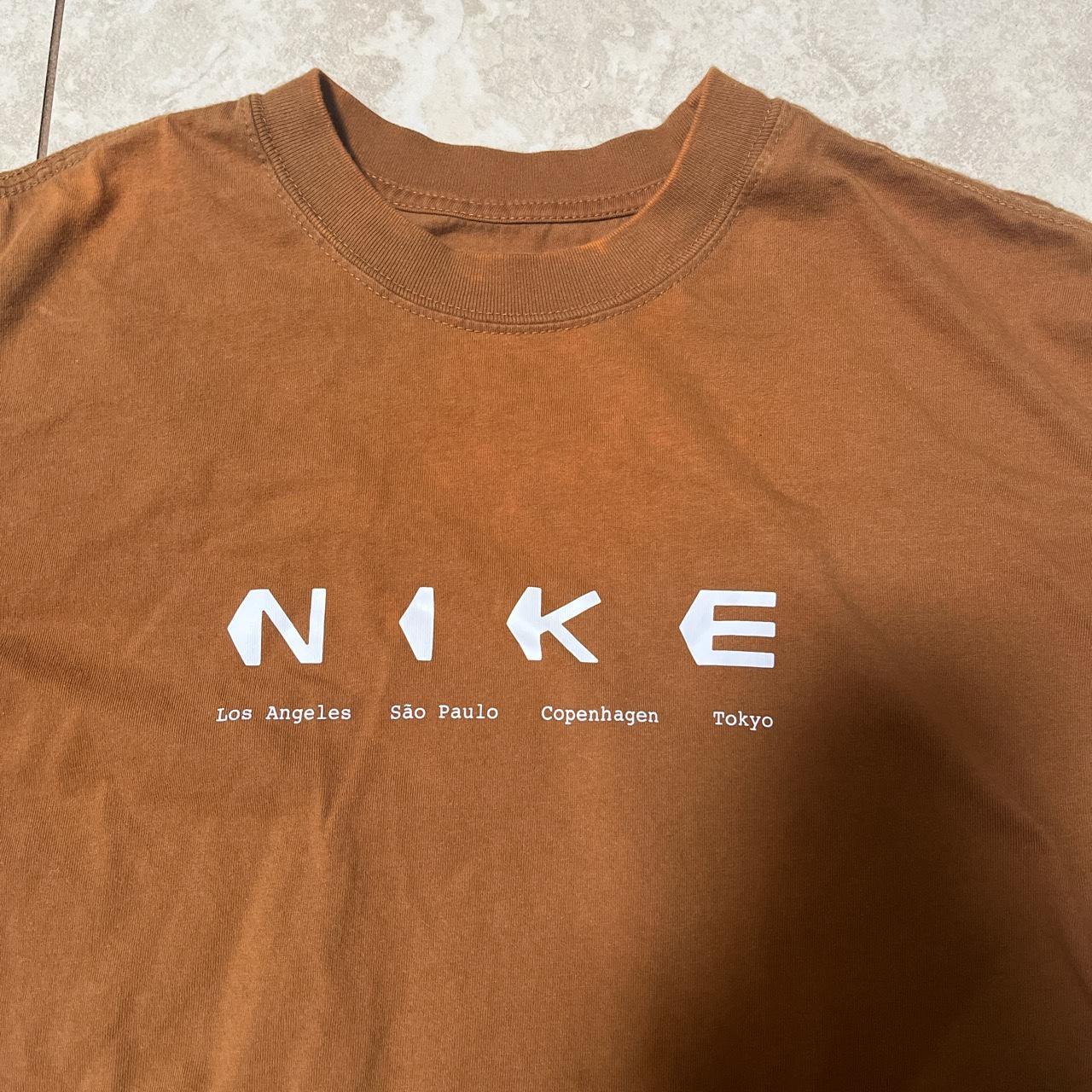 dusty brown nike shirt