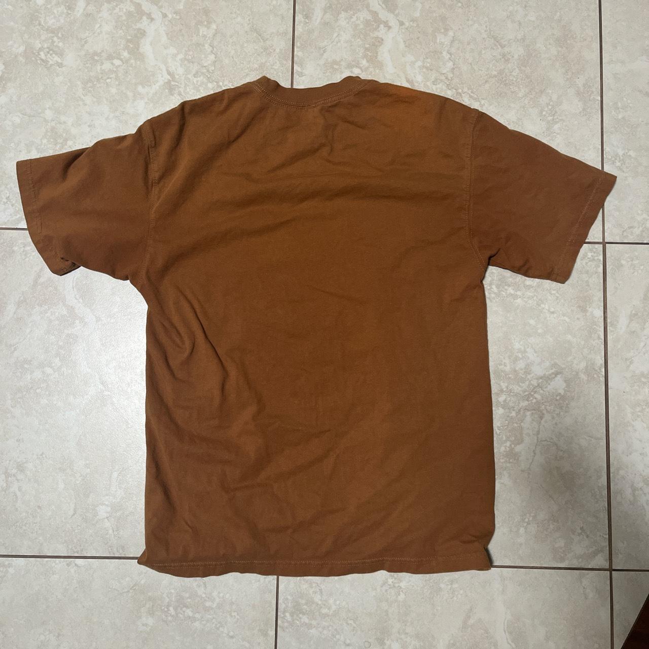 dusty brown nike shirt