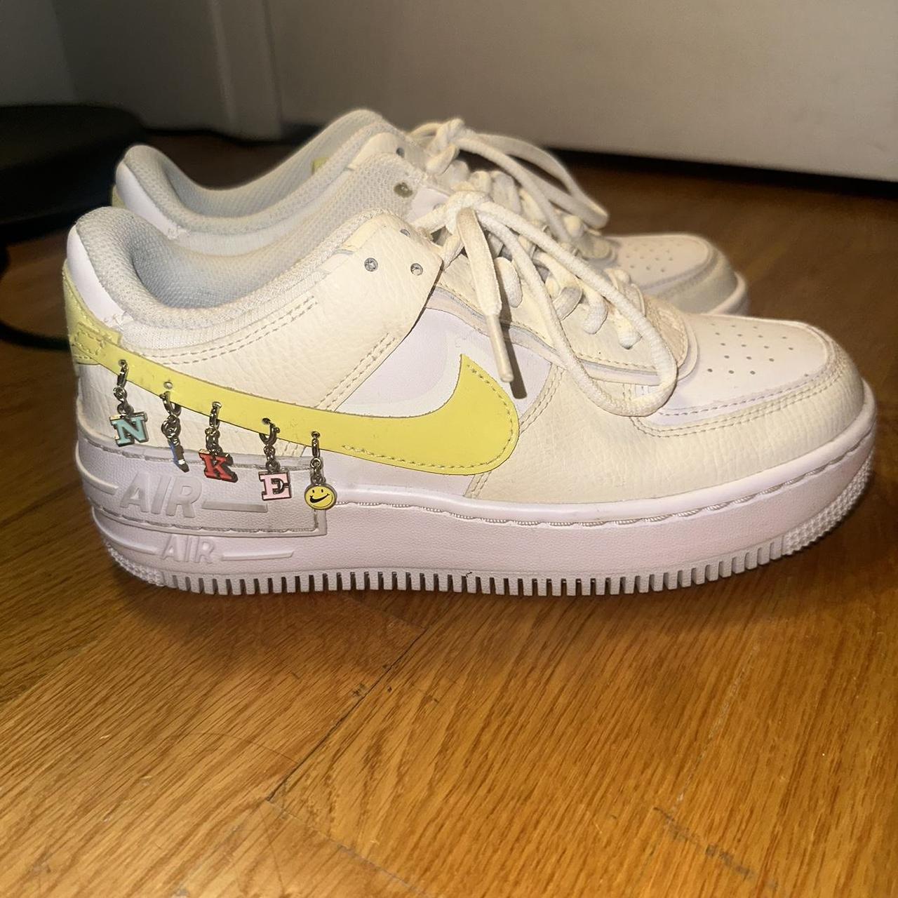 yellow charm nike shoes