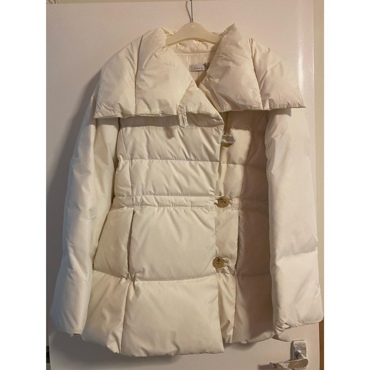 CREAM PINKO PUFFER JACKET, mid length worn a belt