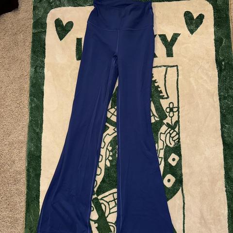 Yogalicous flared yoga pants with seam split leg - Depop