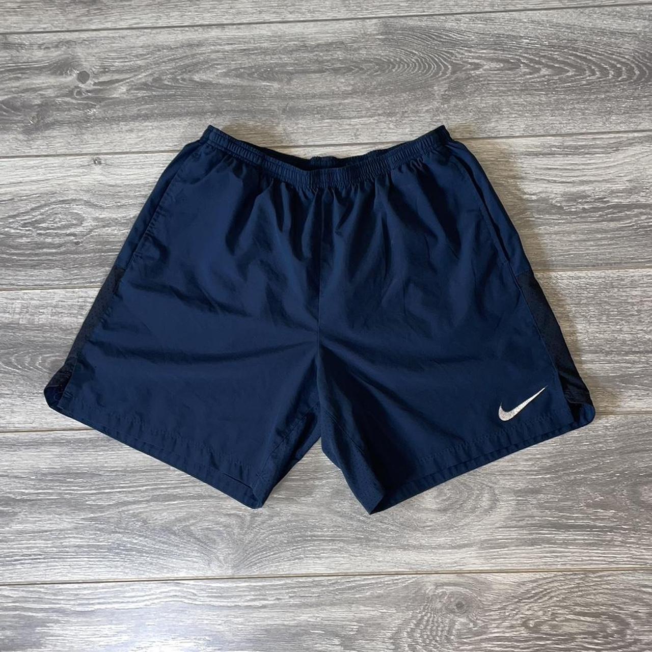 Nike Dri-Fri Navy Blue reflective swoosh swim... - Depop