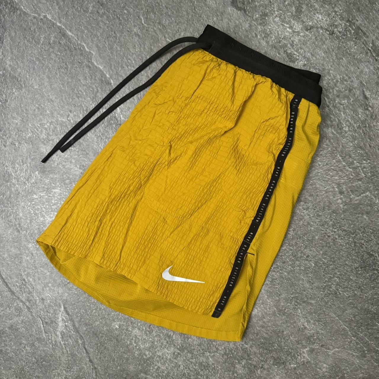 nike flex stride yellow