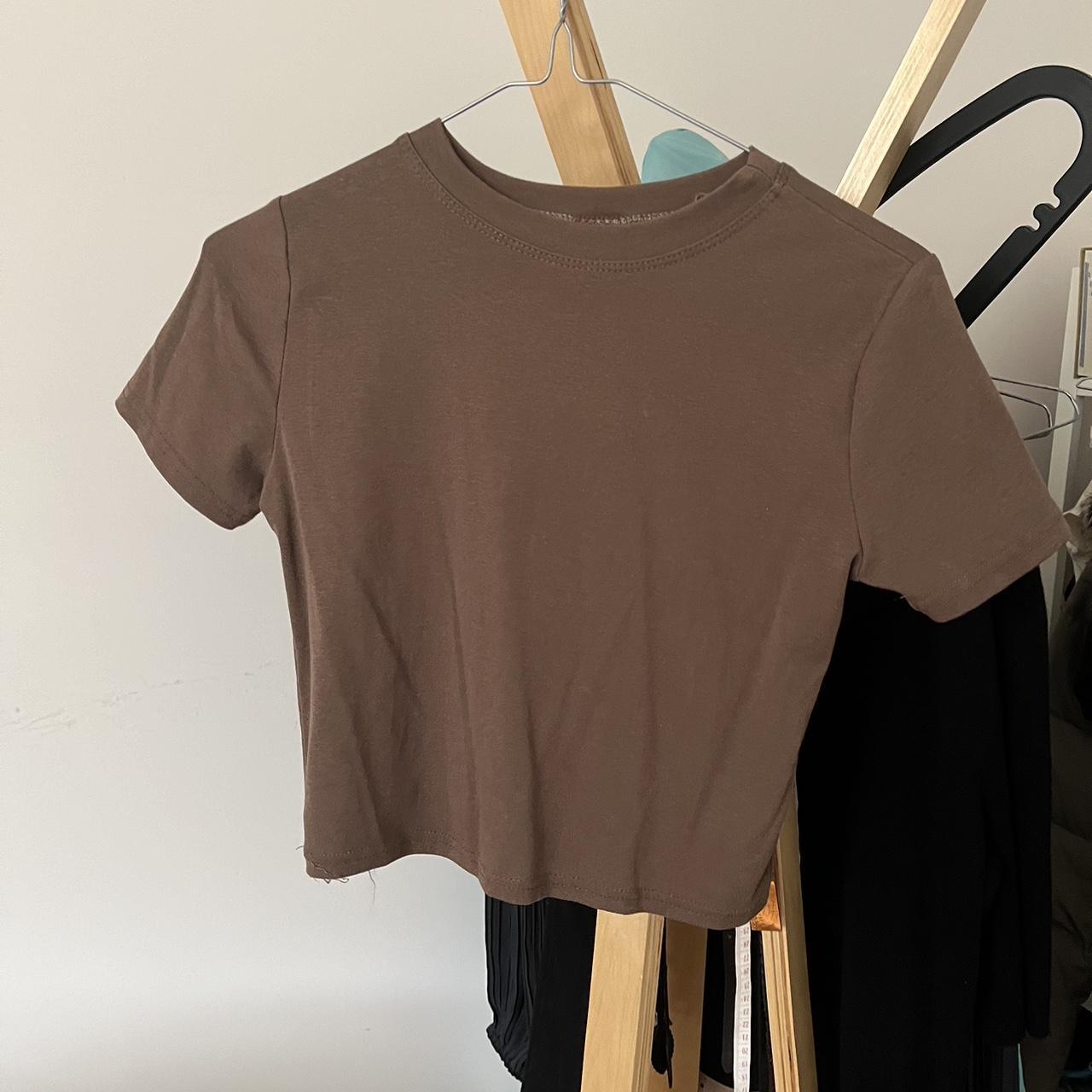 basic brown baby tee 🤎 from cheep never worn, but... - Depop