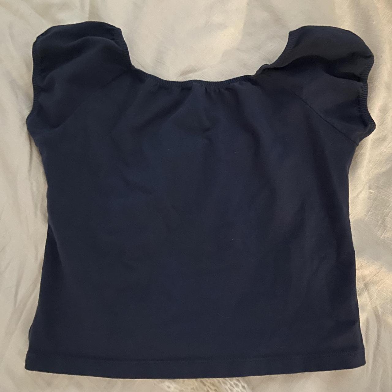 brandy melville eden top in navy blue. im going off... Depop