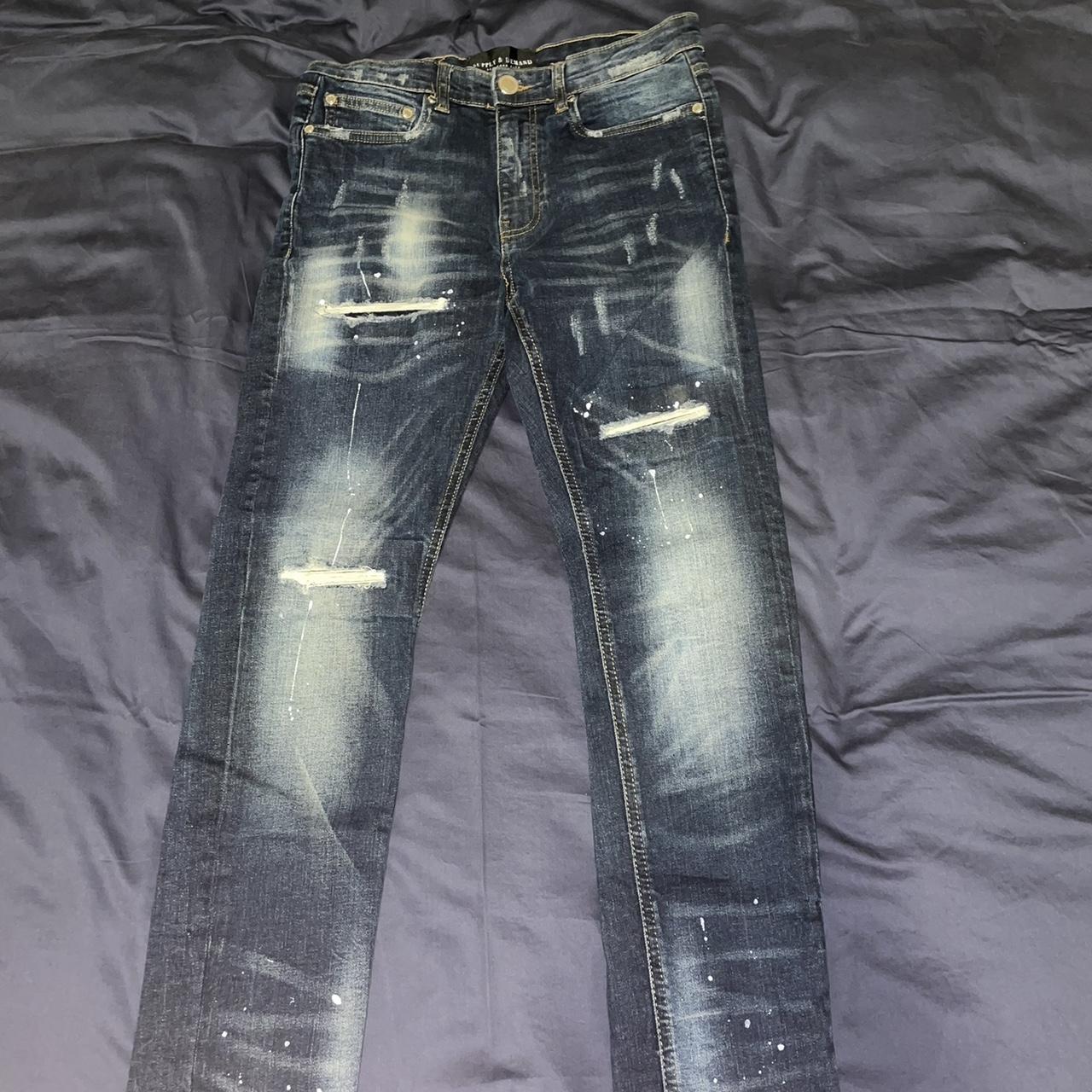 Small W30 supply and demand jeans with paint... - Depop