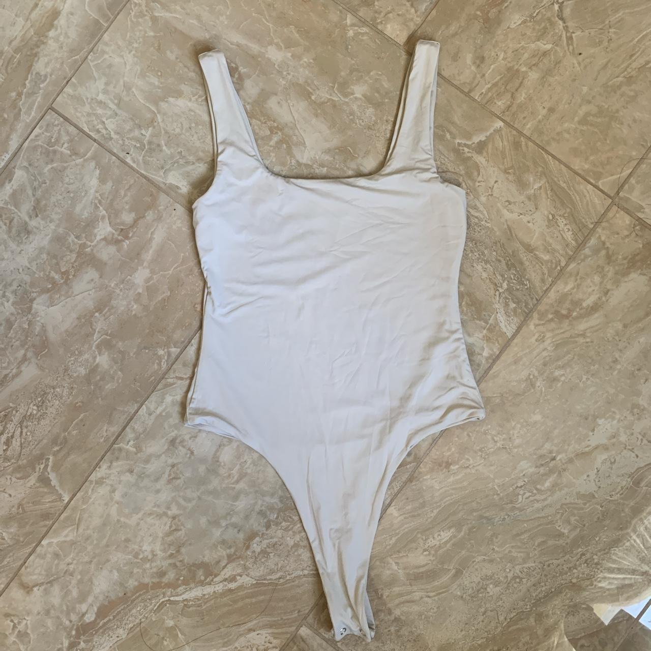 ardene white bodysuit a size small and a size - Depop