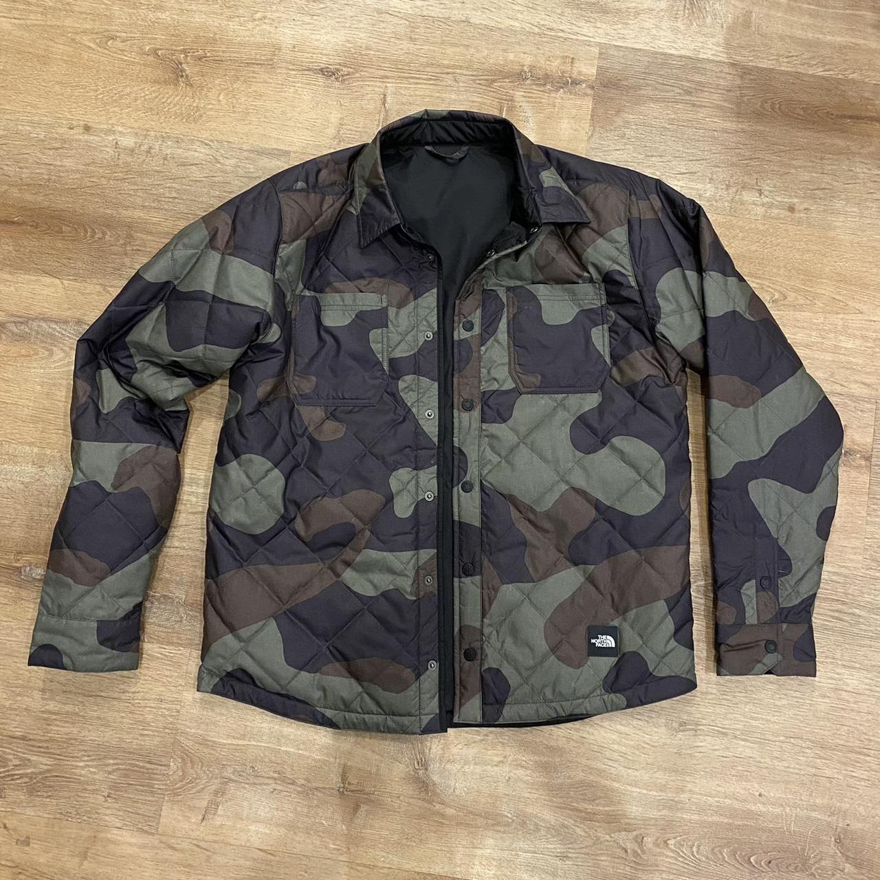 reversible north jace jacket, black/camo size L.... - Depop