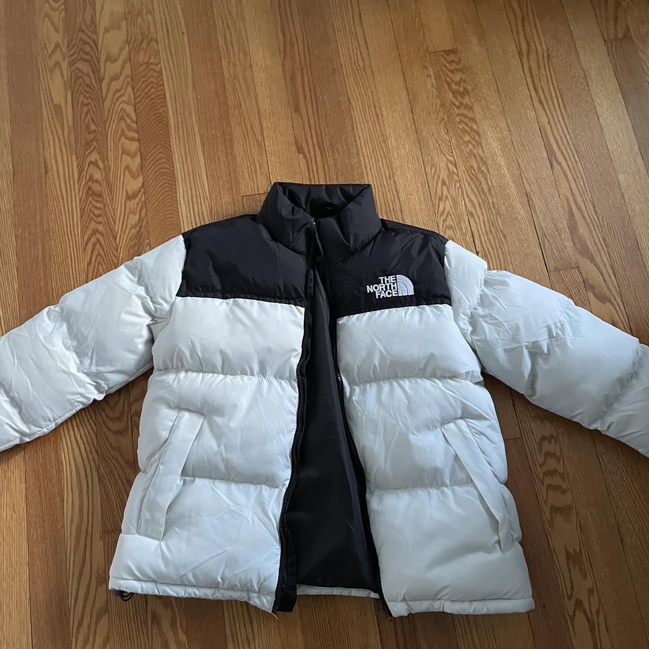 The North face puffer Black and white off white... - Depop