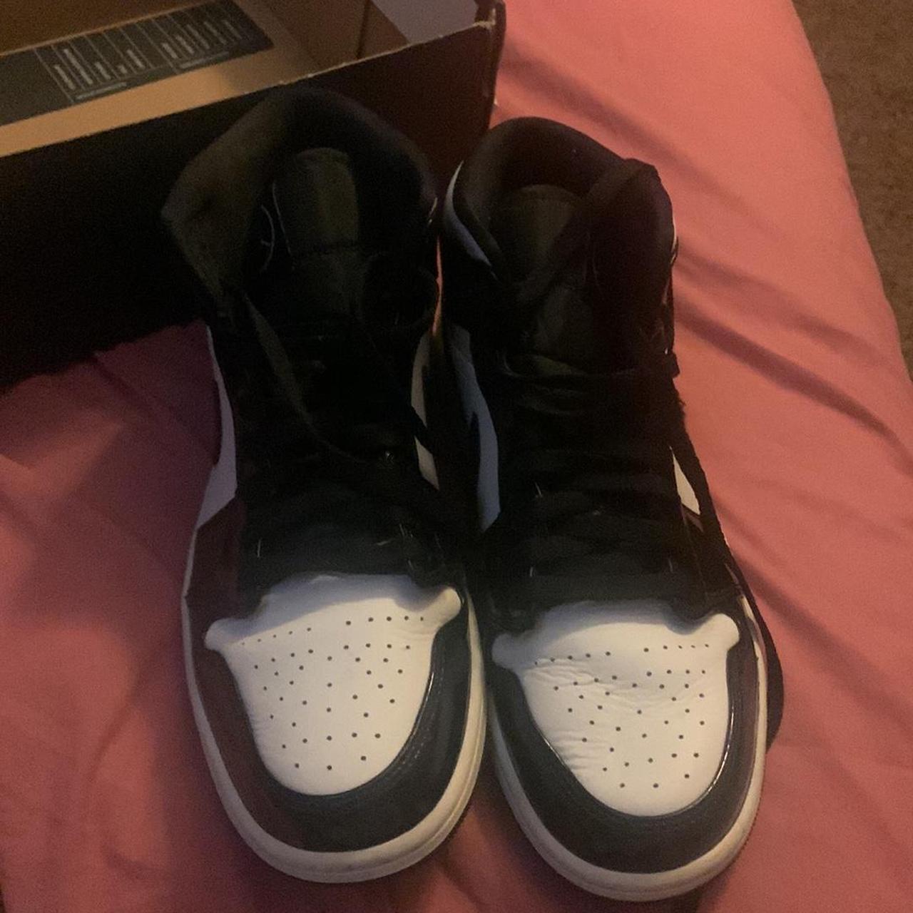 Nike Air Jordan 1 Black and White Mid Sneakers - Depop