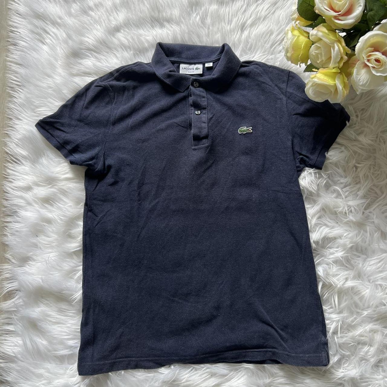 Polo Lacoste bleu marine M - Depop