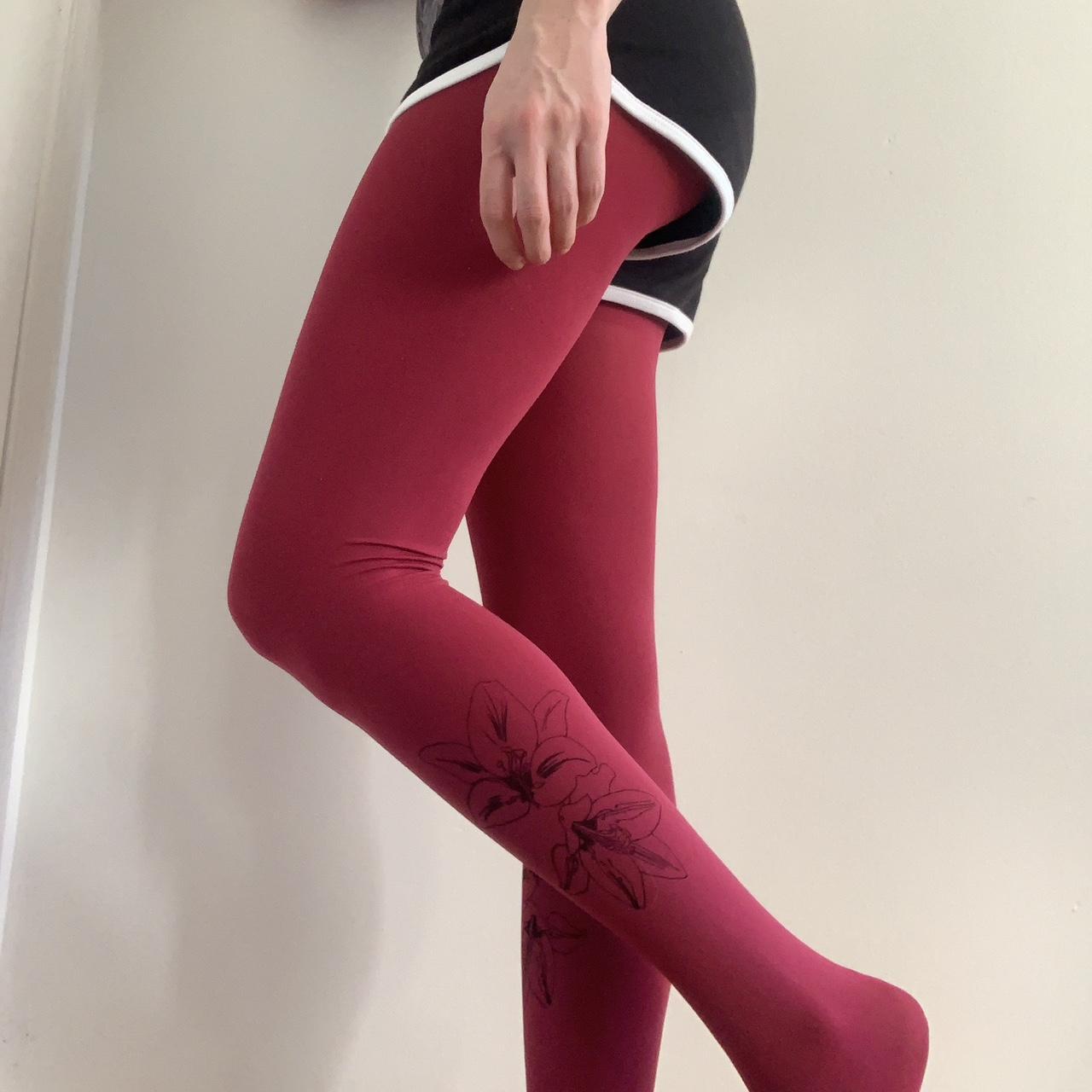 Thick pink patterned tights with black flower on... - Depop