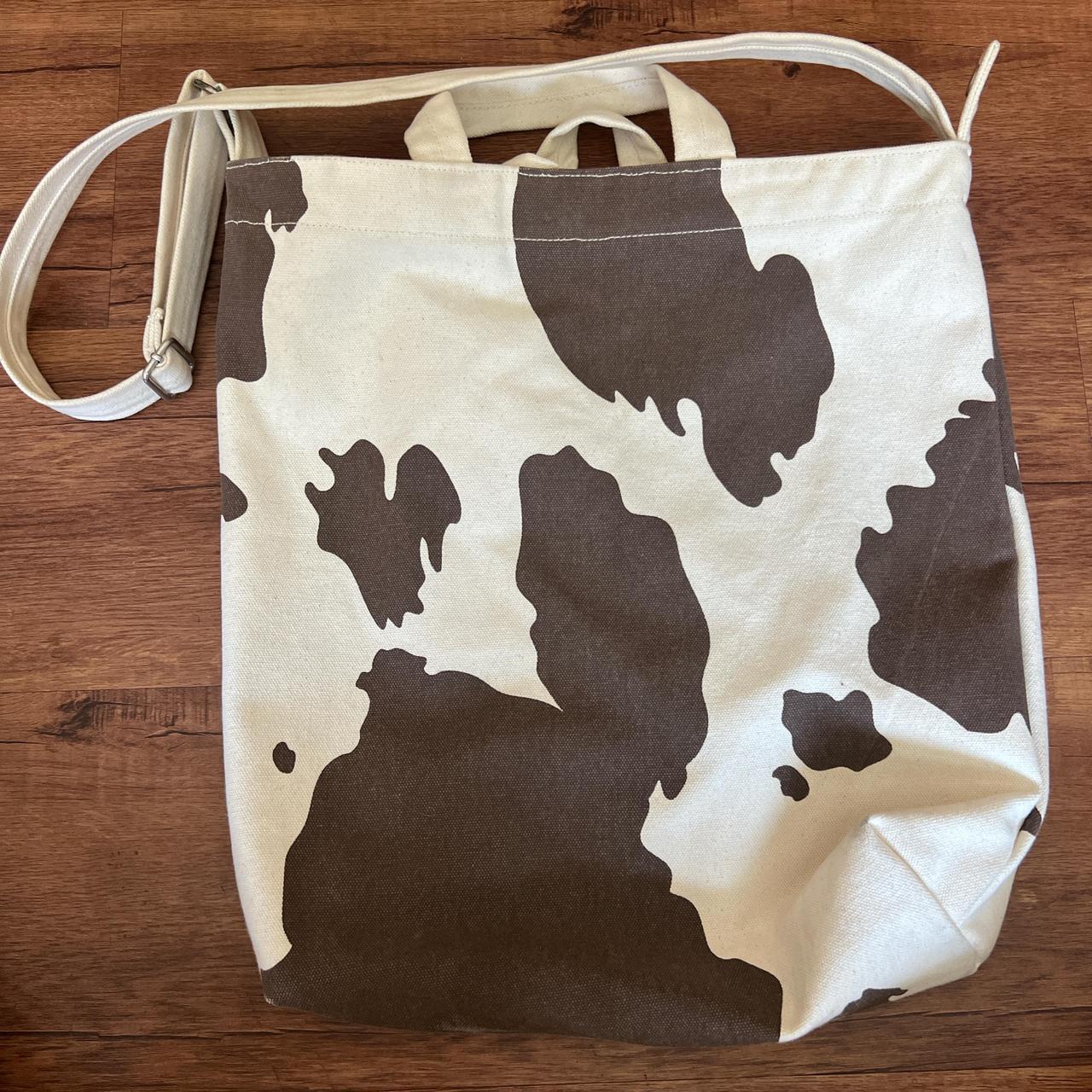 Baggu cow print duck bag. Used and had a slight