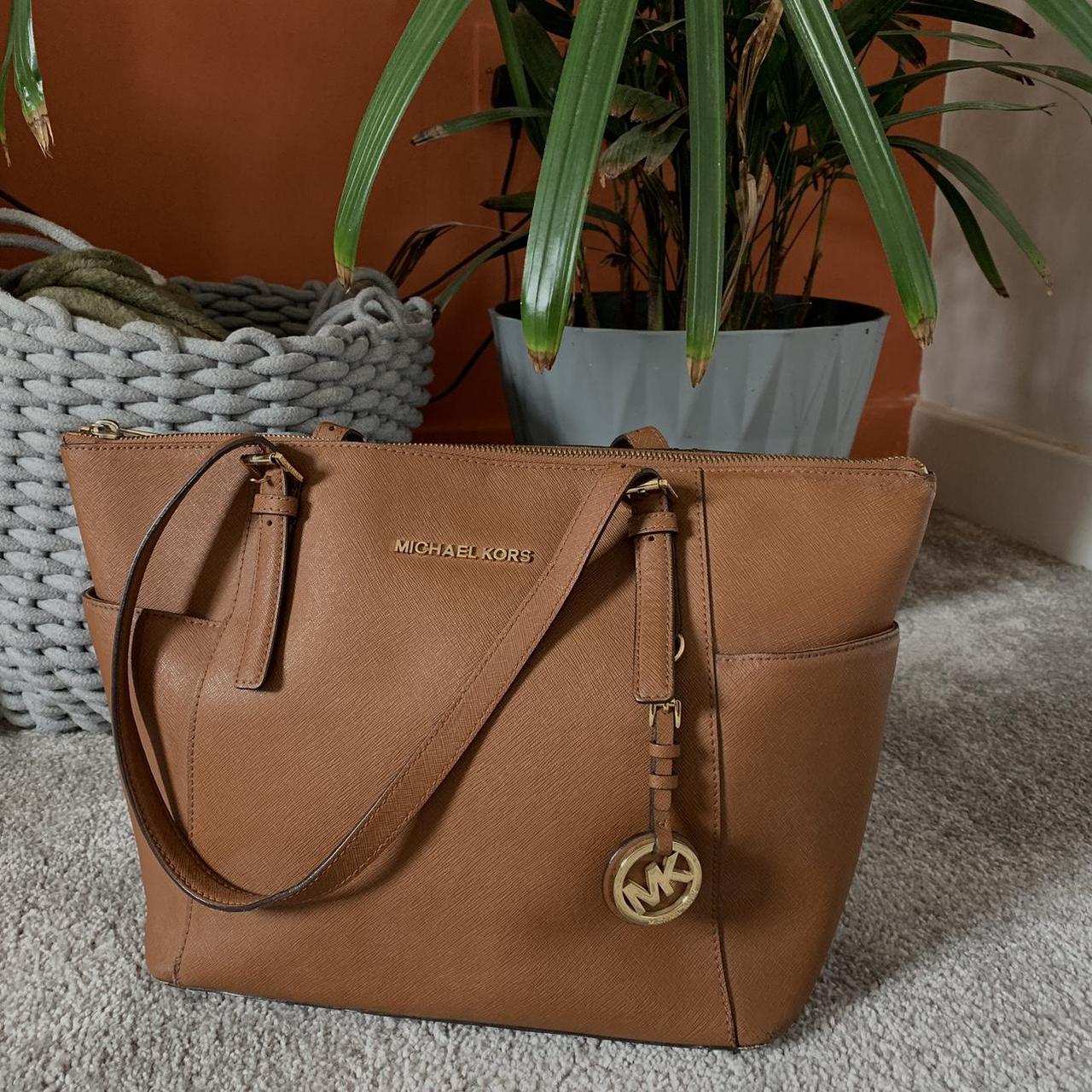 Original Michael Kors brown leather bag Outside is. Depop