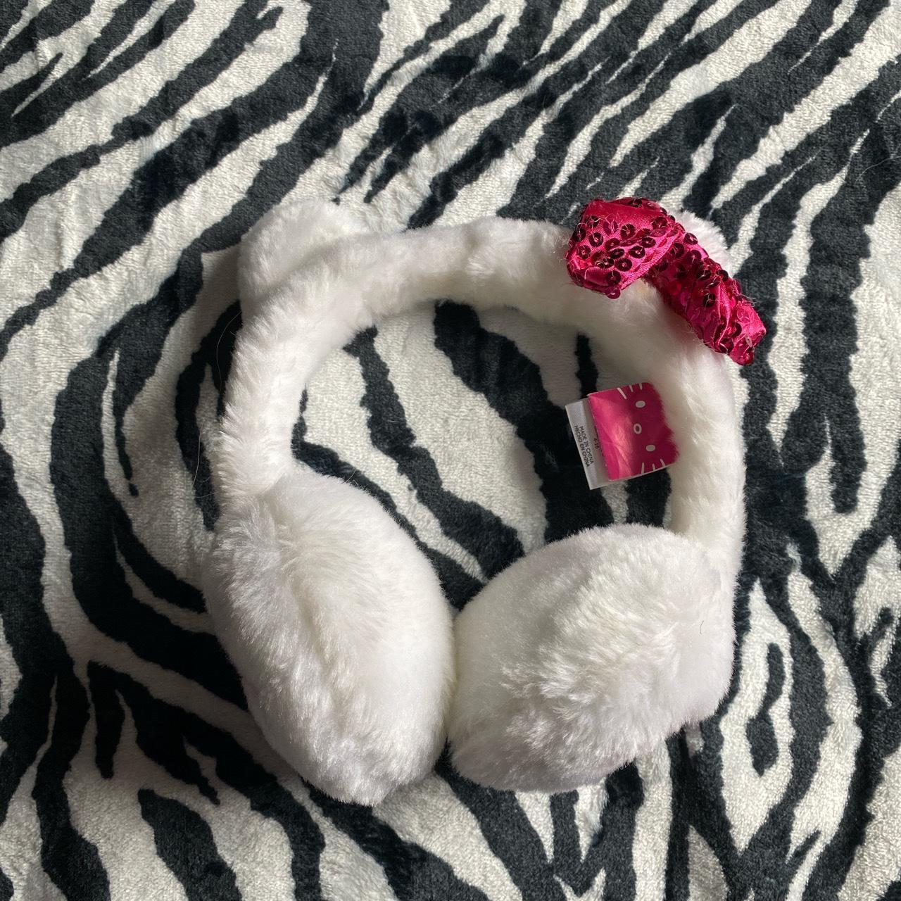 hello kitty earmuffs washed and clean! if u got a... Depop