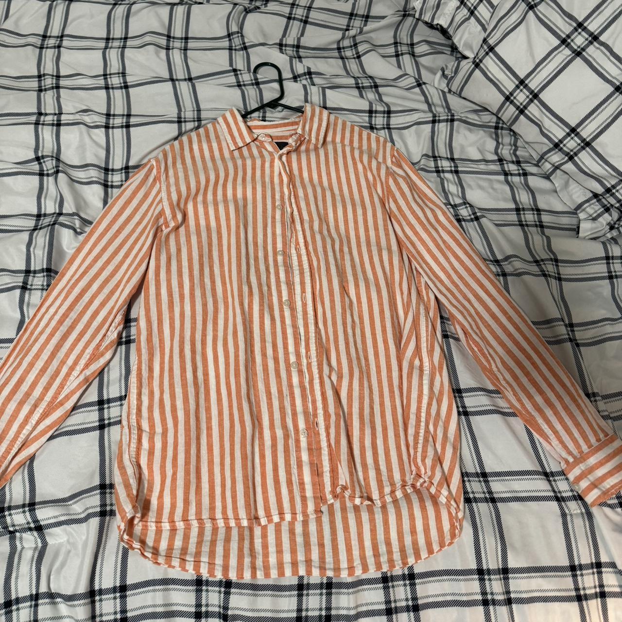 H and shop m orange shirt